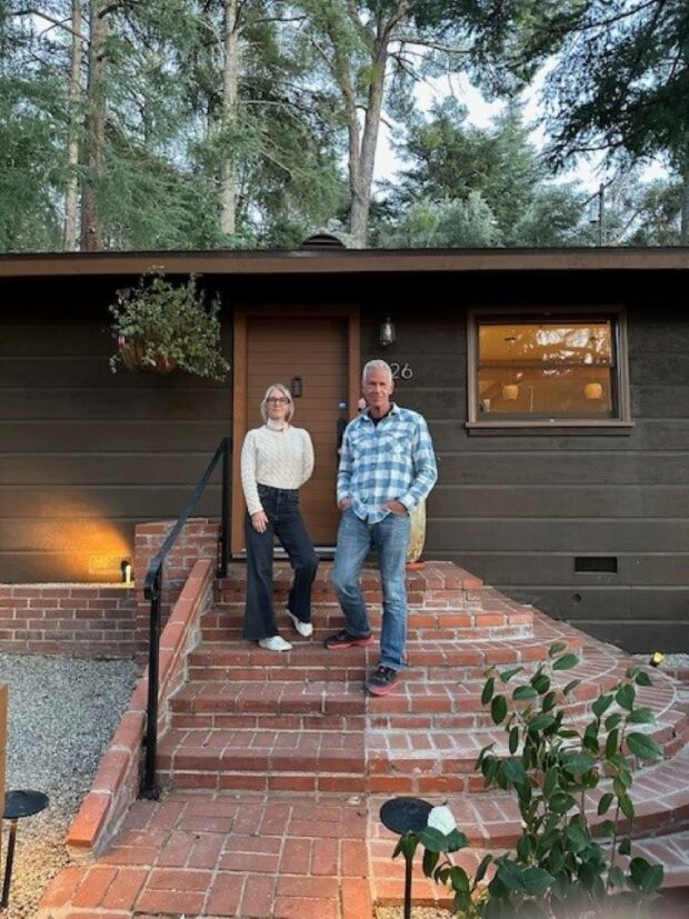 Journalist Russ Banham and his wife Jenny in front of their hardened home